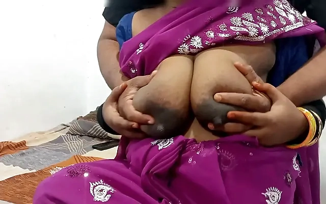 indian couple at honeymoon in hotel